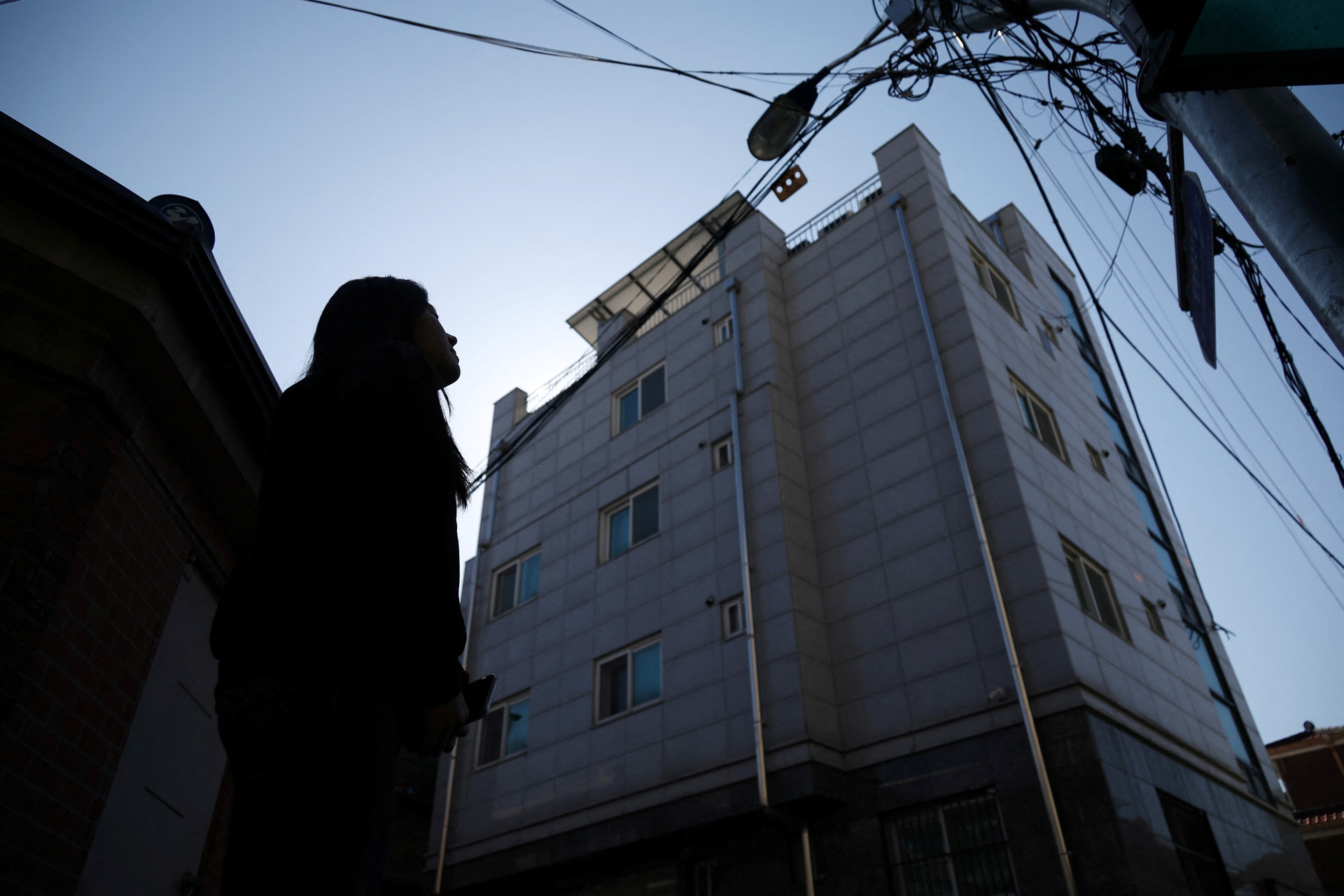 South Korea's 'jeonse' rent-free renters hit by property downturn | Reuters