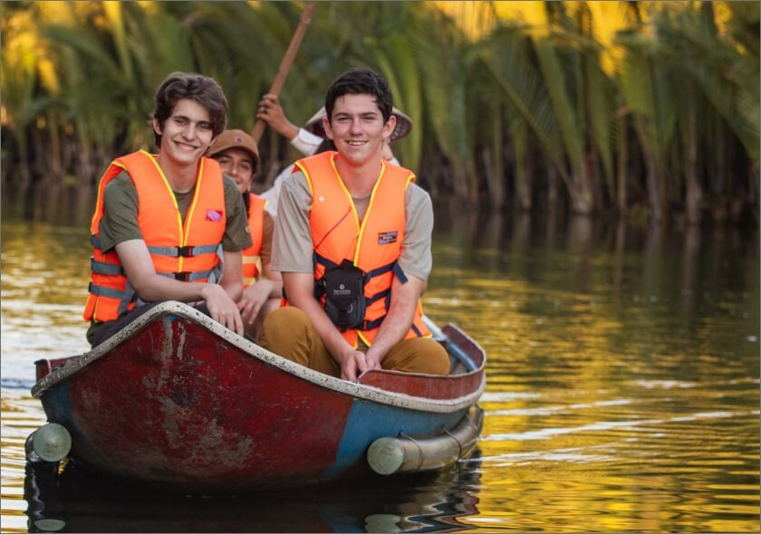 students in boat vietnam.jpg