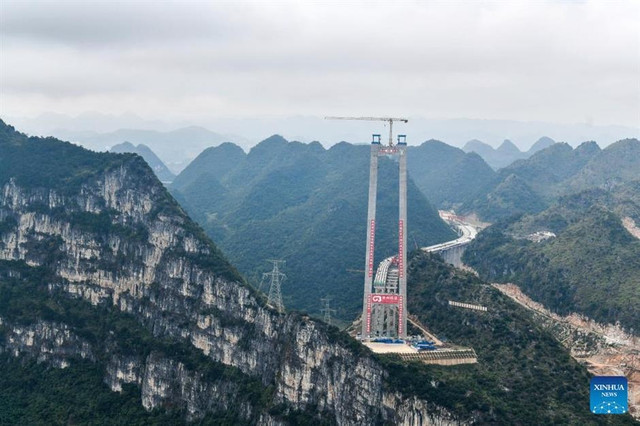 Tự phá kỷ lục của chính mình, láng giềng Việt Nam xây cầu cao nhất thế giới ẩn sâu trong hẻm núi, rút ngắn thời gian di chuyển từ 70 phút xuống còn 1