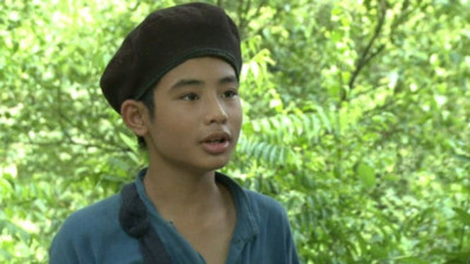 Diễn viên Đào Bá Huy trong vai Kim Đồng trong phim Anh hùng làng Nà Mạ - Bộ phim tái hiện lại cuộc đời của người anh hùng nhỏ tuổi