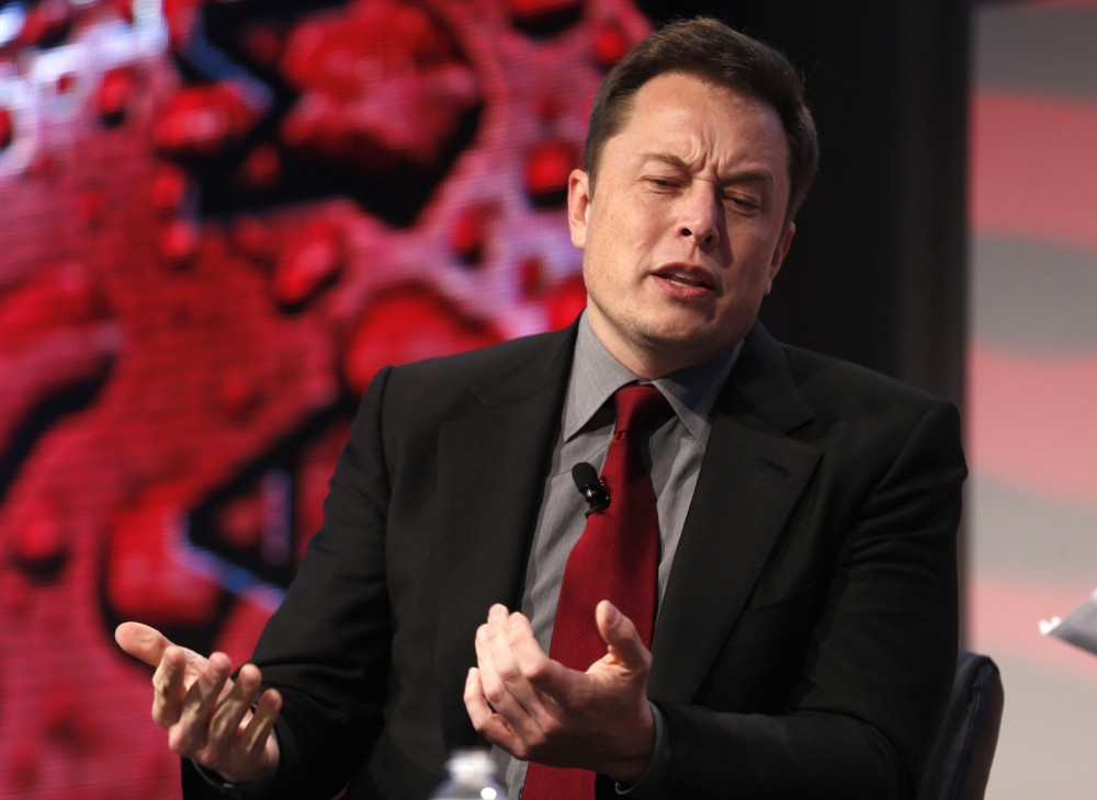 Elon Musk đề nghị huyền thoại đầu tư Warren Buffett hãy bán toàn bộ cổ phiếu Apple để mua Tesla