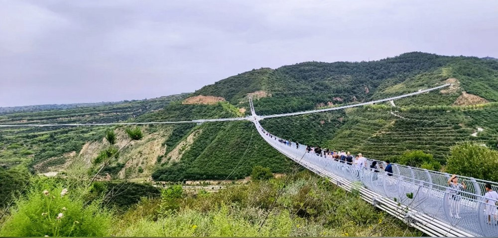 Láng giềng Việt Nam hoàn thiện thành công siêu cầu kính nối 4 ngọn núi dài thứ 3 thế giới, đạt bước tiến vĩ đại cho ngành kỹ thuật - xây dựng - ảnh 5