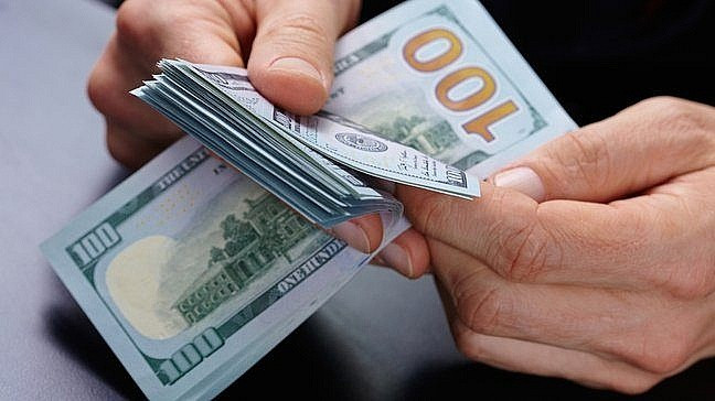 Tỷ giá trung tâm vượt 25.000 VND/USD sau quyết định của Fed