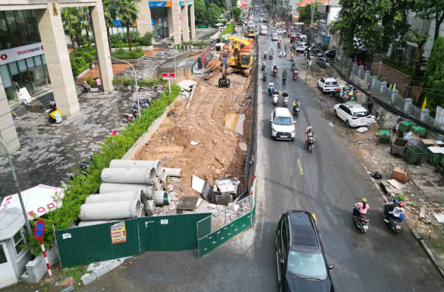 Dự án mở rộng cung đường hơn 1km 'cõng' 20 tòa chung cư tại Hà Nội lùi thời hạn hoàn thành- Ảnh 2.