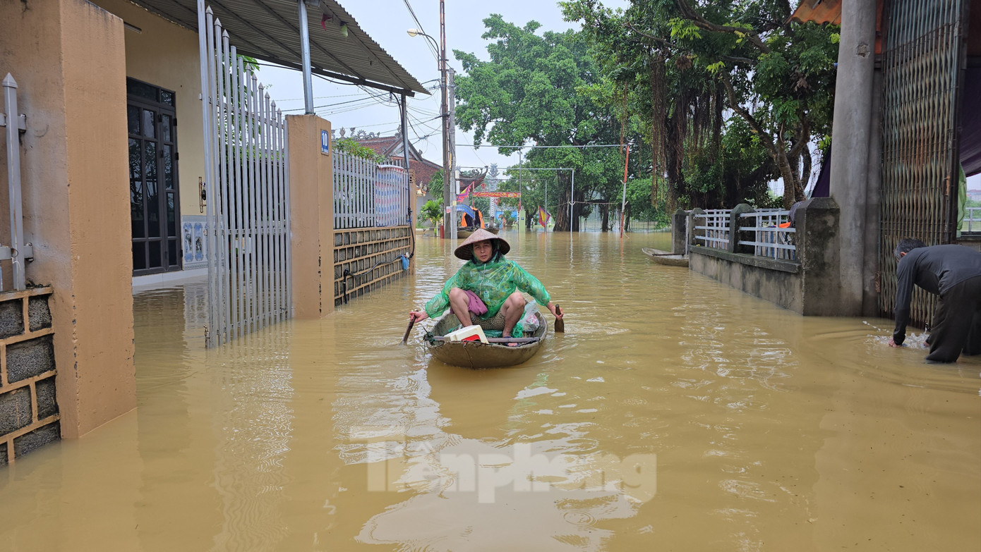 Nước sông Bùi dâng cao gây ngập lụt ở khu vực thôn Bùi Xá, xã Xuân Mai 1000023038.jpg