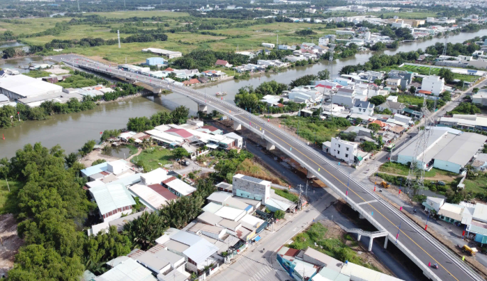 Cây cầu 500 tỷ tại thành phố giàu nhất Việt Nam: Hoàn thành sau 6 năm khởi công, rút ngắn kết nối từ 10km còn 500m với 11 nhịp cầu- Ảnh 1.