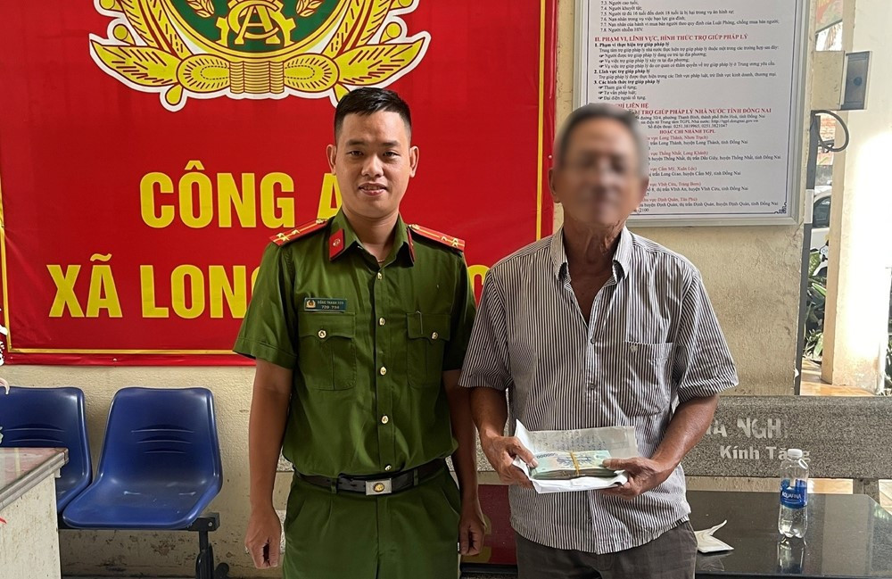 'Cán bộ Công an' gọi điện yêu cầu nộp 70 triệu, cụ ông 70 tuổi cầm tiền đến thẳng trụ sở làm việc - ảnh 1