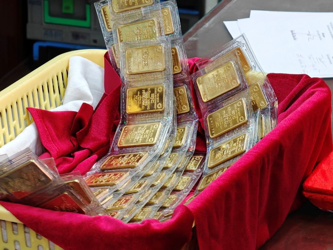 Giá vàng miếng SJC niêm yết 146,4 - 148,4 triệu đồng/lượng mua vào - bán ra. vv1.jpg