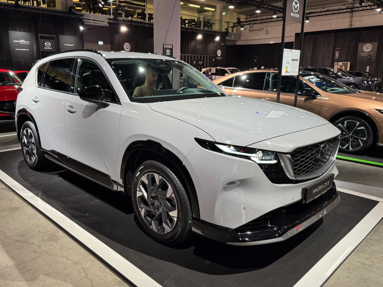 2026-mazda-cx-5-front-three-quarters-1762474322967-1762474323420108963451.jpg