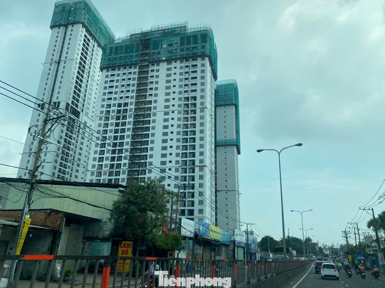 Một con đường khác cũng đang gánh hàng chục ngàn căn hộ là quốc lộ 1K, nối từ TPHCM đến Đồng Nai. tp-1-7160.jpg