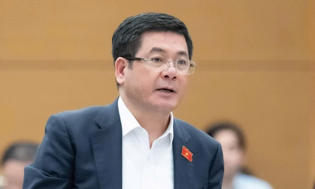 Bộ trưởng Công Thương Nguyễn Hồng Diên trình bày dự thảo nghị quyết tại phiên họp tối 2411 (Ảnh Media Quốc hội)