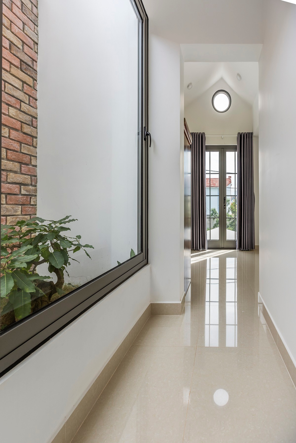 Ngôi nhà lưu giữ 'hơi thở' Tây Nguyên giữa kiến trúc đương đại- Ảnh 7. Ngôi nhà lưu giữ 'hơi thở' Tây Nguyên giữa kiến trúc đương đại- Ảnh 7.