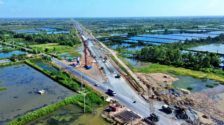 Chưa đầy 24h nữa, Việt Nam chính thức thông xe tuyến cao tốc 27.500 tỷ, mang theo kỳ vọng của hàng triệu người dân miền Tây Nam Bộ- Ảnh 1. Chưa đầy 24h nữa, Việt Nam chính thức thông xe tuyến cao tốc 27.500 tỷ, mang theo kỳ vọng của hàng triệu người dân miền Tây Nam Bộ- Ảnh 1.
