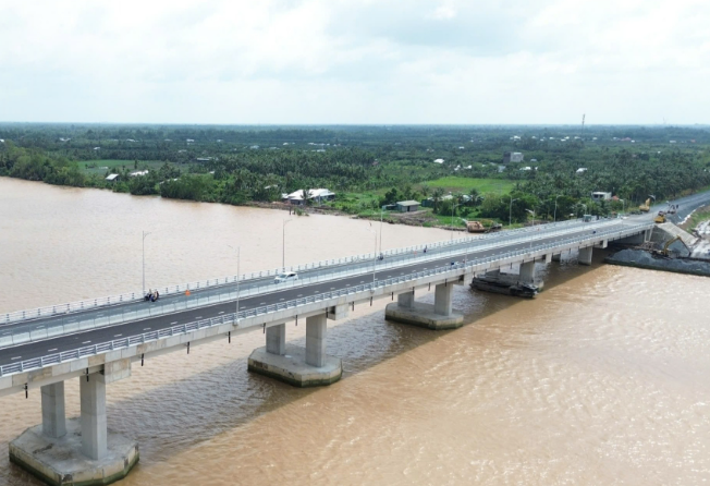 Thông xe cầu vượt sông 4.000 tỷ xóa bỏ toàn bộ các bến phà lâu đời, nối thông 2 tỉnh thành miền Tây- Ảnh 2. Thông xe cầu vượt sông 4.000 tỷ xóa bỏ toàn bộ các bến phà lâu đời, nối thông 2 tỉnh thành miền Tây- Ảnh 2.