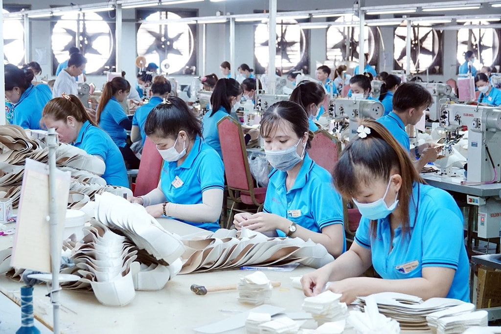 Áp lực đơn hàng đang khiến các doanh nghiệp ráo riết tuyển lao động phổ thông. Ảnh minh họa