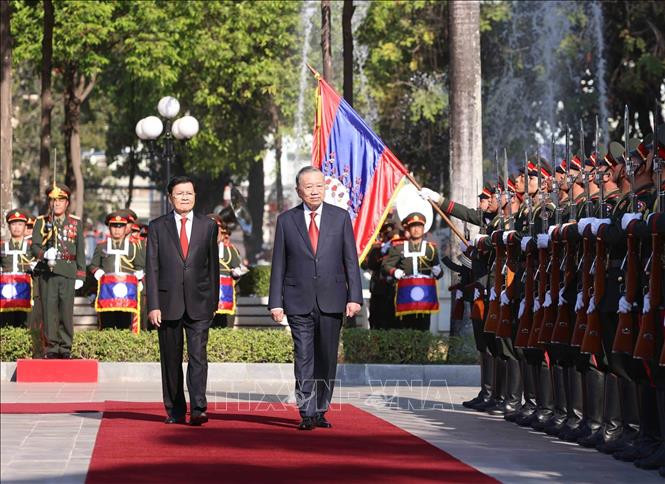 Lễ đón trọng thể Tổng Bí thư Tô Lâm tại thủ đô Viêng Chăn (Lào)- Ảnh 3. Lễ đón trọng thể Tổng Bí thư Tô Lâm tại thủ đô Viêng Chăn (Lào)- Ảnh 3.