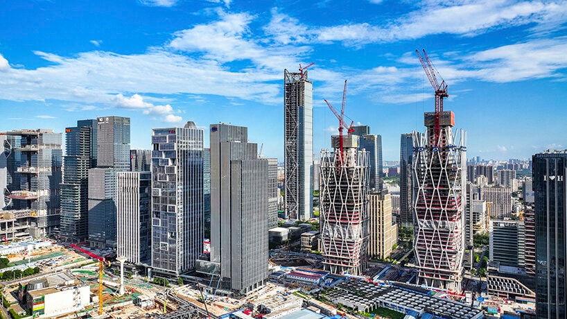 Tháp đôi văn phòng cao đến 200m sắp hoàn thiện: Quy mô hơn 170.000m2, kiến trúc ‘khoác’ lưới kim cương ấn tượng- Ảnh 1.