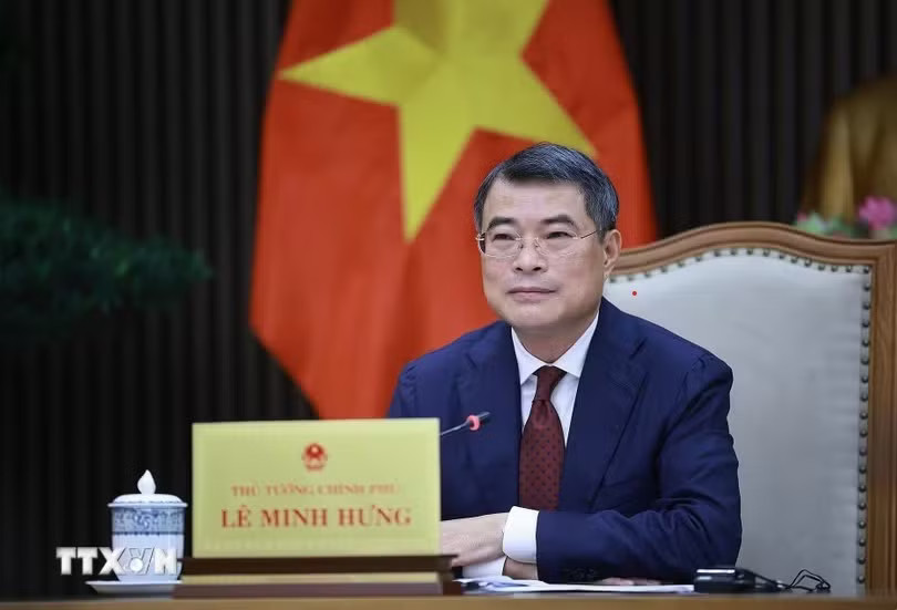 Thủ tướng Lê Minh Hưng tại cuộc điện đàm. Ảnh: TTXVN Việt Nam – Singapore nhất trí sẽ ký hiệp định mua bán điện phát thải thấp - Ảnh 1.