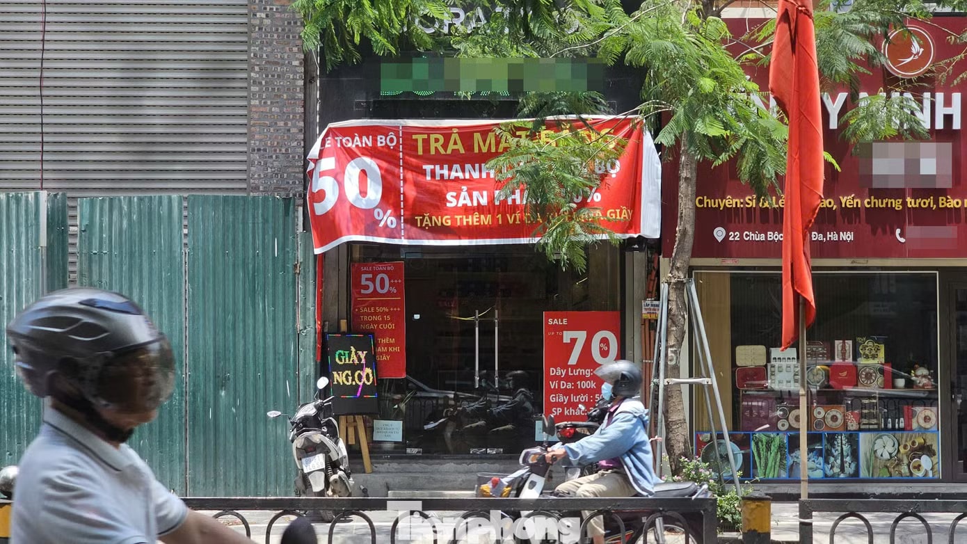 Lý do nhiều tuyến phố 'hái ra tiền' ở Hà Nội 'cửa đóng then cài' - Ảnh 7.