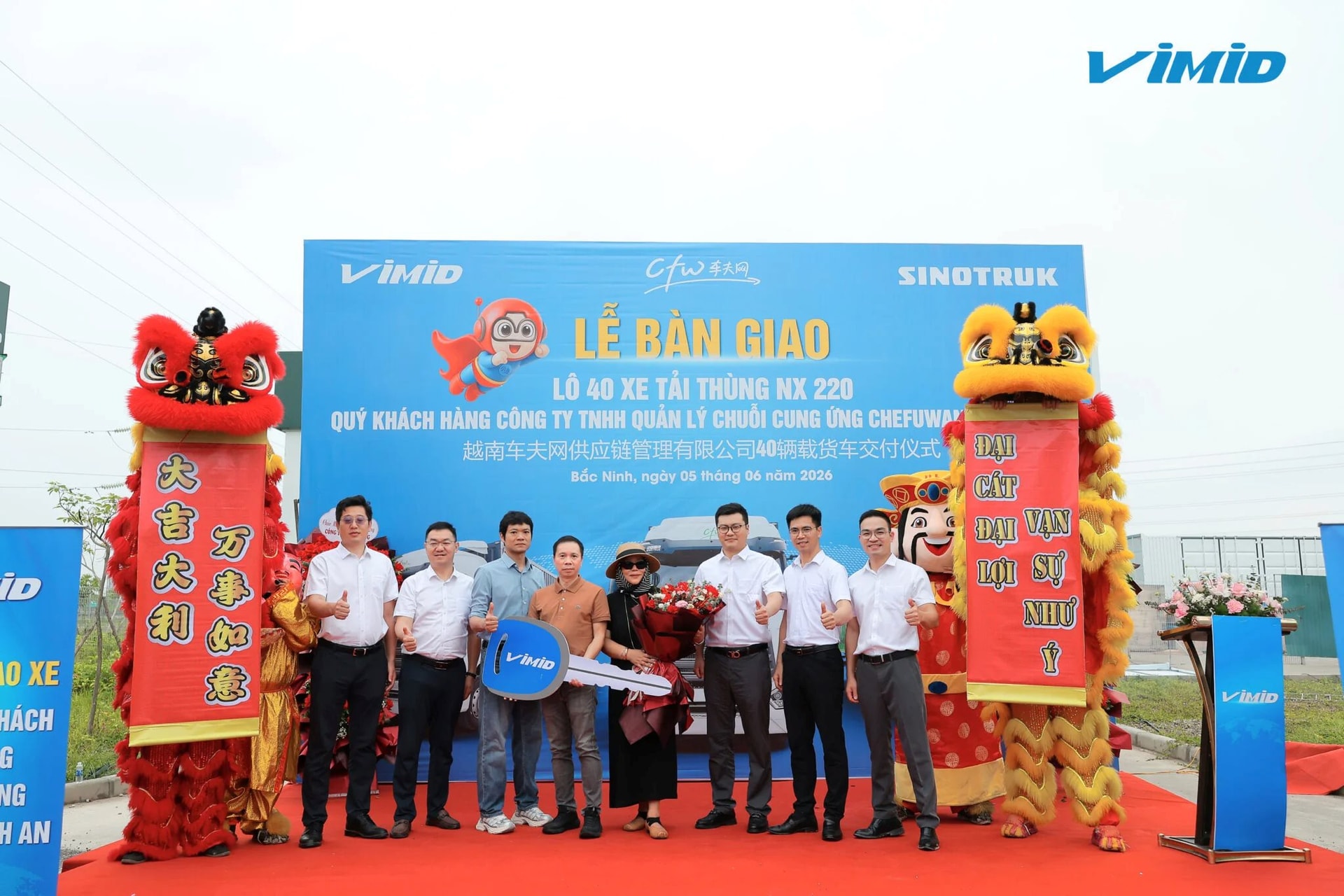 le-ban-giao-lo-40-xe-tai-thung-howo-nx-220-giua-vimid-va-chefuwang-viet-nam-compressed.jpg