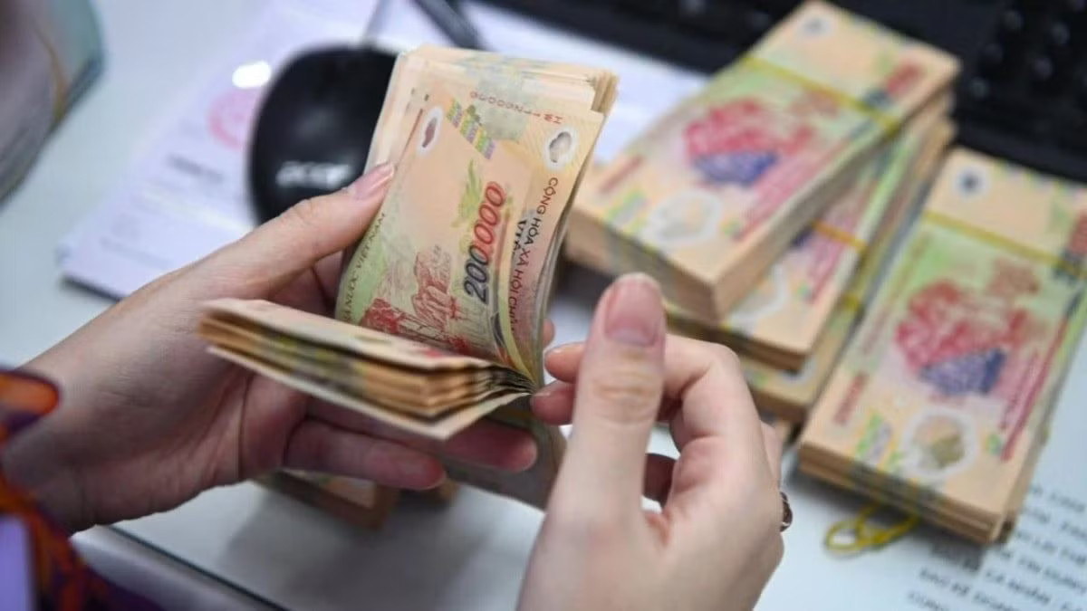 Lương tối thiểu dự kiến là 5,7 triệu đồng/tháng - Ảnh 1.