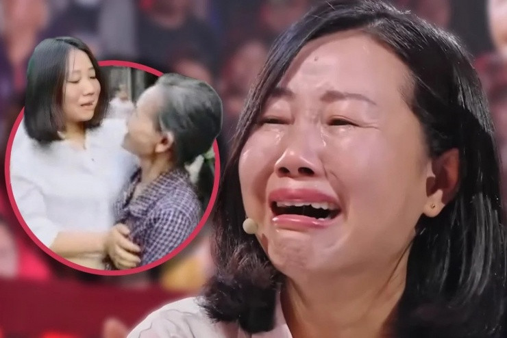 Nữ doanh nhân bật khóc trên sóng truyền hình khi đoàn tụ với gia đình. Ảnh- SCMP