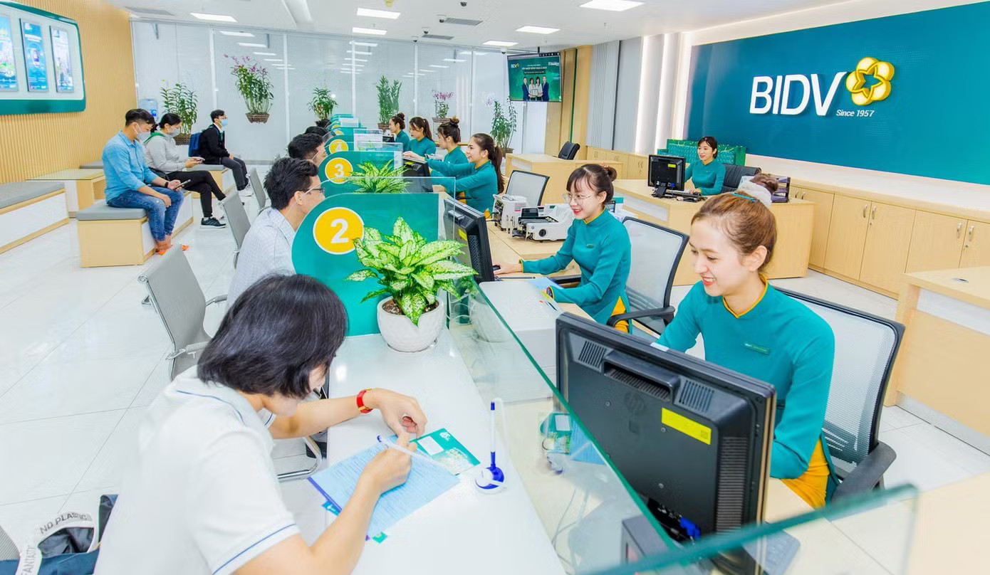 Ngân hàng BIDV giảm lãi suất cho khách hàng Giảm lãi suất cho vay: Doanh nghiệp tiếp cận thế nào, giải ngân ra sao? - Ảnh 1.