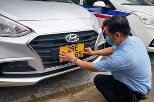 Tăng mức phạt với xe kinh doanh vận tải không đổi sang biển số vàng