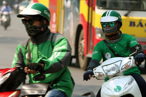 Grab thu "phụ phí nắng nóng" với nhiều dịch vụ