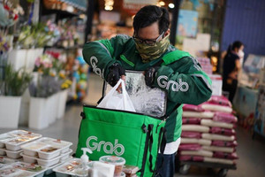 Grab thông báo thu phụ phí khách hàng dịp Tết Quý Mão 2023