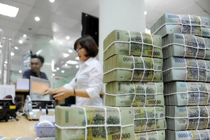 Chờ nhu cầu vốn tín dụng