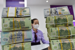 VND chỉ mất 1,3% giá trị so với cuối năm 2023: Cú hích từ Fed