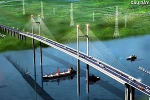 Tái khởi động cây cầu dây văng có tĩnh không thông thuyền cao nhất Việt Nam sau nhiều năm đứng hình