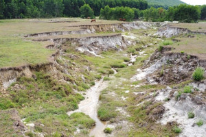 Khai thác khoáng sản xong DN 'đòi' phá sản, để lại đồng ruộng bị xé toạc