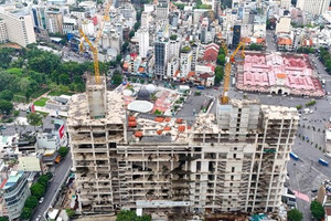 Tháp đôi chọc trời ‘đắp chiếu’ nhiều năm, từng liên quan đến bà Trương Mỹ Lan đã thi công trở lại