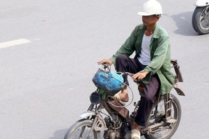 Mức xử phạt với người đi xe máy quá cũ nát, trường hợp xe không đạt định khí thải có bị loại bỏ ngay?