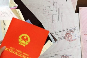 Từ bây giờ, thửa đất nằm trên địa bàn 2 xã có được cấp sổ đỏ không?