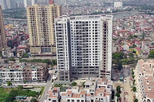 Nhà ‘trên giấy’ sắp nhận bàn giao nhưng chưa đề nghị cấp sổ đỏ có được phép sang tên không?