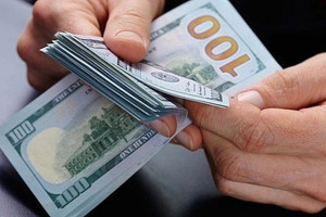 Tỷ giá trung tâm vượt 25.000 VND/USD sau quyết định của Fed