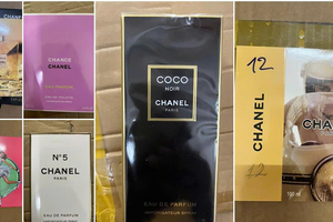 Danh tính vợ chồng cầm đầu đường dây sản xuất 10.000 chai nước hoa Chanel, Dior giả