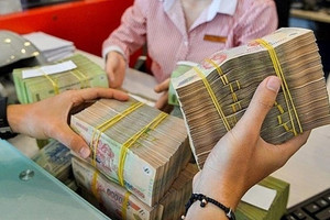 Bà T. 71 tuổi đến ngân hàng rút sạch tiền tiết kiệm, nhân viên Agribank thực hiện giao dịch rồi lập tức báo công an