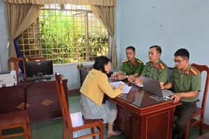 Đăng tin ‘bảo hiểm y tế tăng 30%’, bà T. bị công an mời lên làm việc