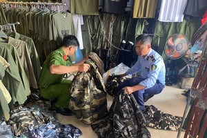 Người dân có thể phạt đến 75 triệu đồng nếu mua bán trái phép loại trang phục này