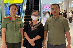 Bắt, di lý Nguyễn Thị Kim Oanh từ Lào về Việt Nam