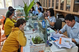 Luật mới về tiền lương làm căn cứ đóng BHXH, lương hưu của ai sẽ bị ảnh hưởng?