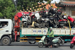 Số phận hàng nghìn xe máy vi phạm chất đống ở TPHCM: Được đưa ra đấu giá với giá khởi điểm từ 370.000 đồng/chiếc