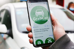 Grab thử nghiệm dịch vụ gọi ô tô điện tại Hà Nội, chính thức bước vào cuộc đua với Xanh SM