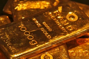 Giá vàng giảm, đồng USD mạnh lên, Fed phát tín hiệu thận trọng