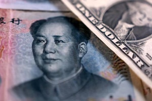 Trung Quốc ồ ạt gom mạnh USD, hãm đà tăng kỷ lục của nhân dân tệ