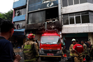 Cháy tòa nhà văn phòng khiến ít nhất 22 người thiệt mạng, nghi ngờ do chập pin